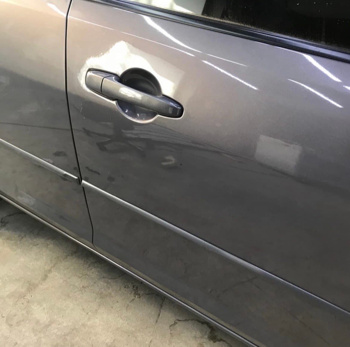 Door Dent — after repair